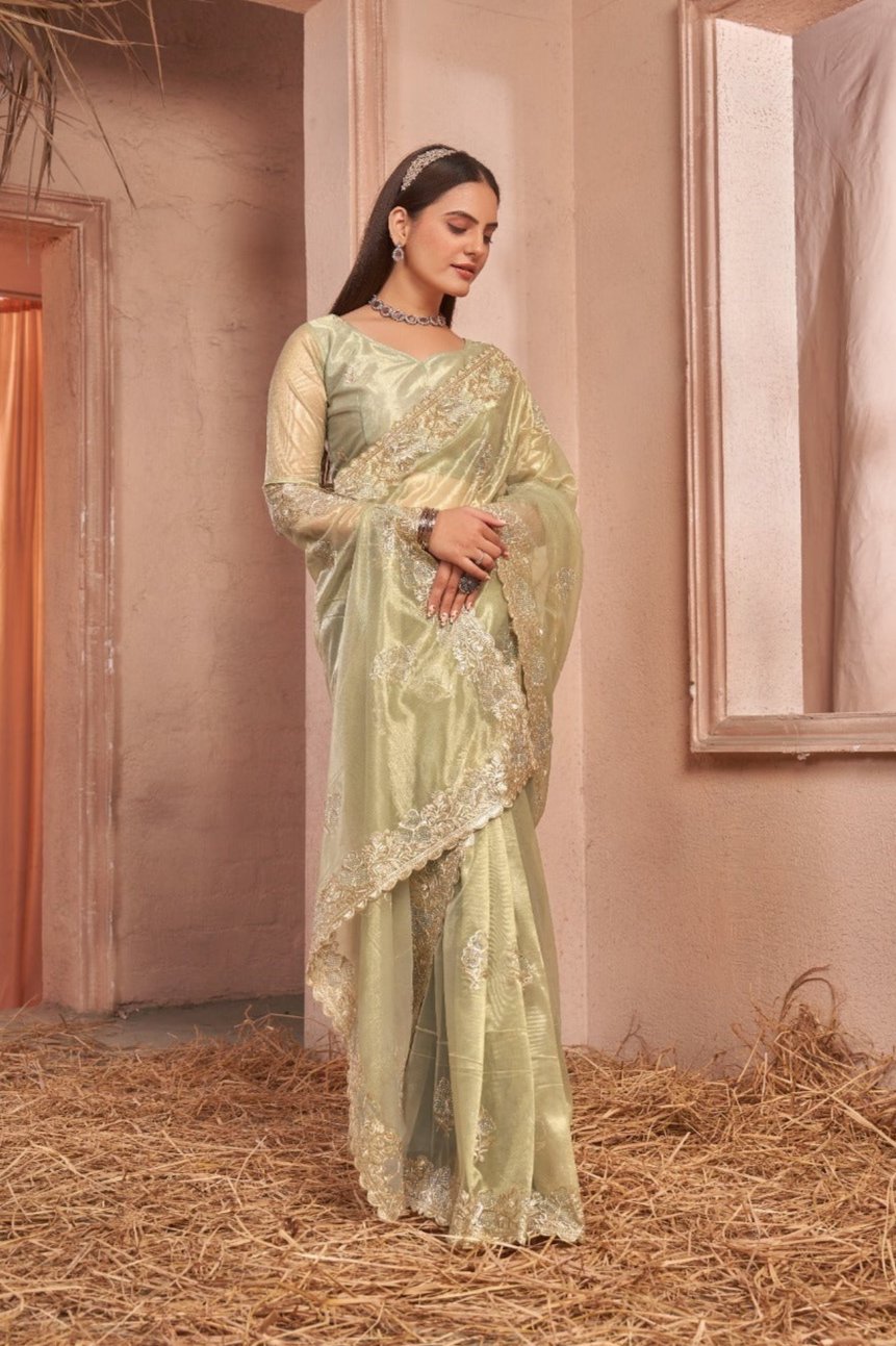 Chic Shimmer Net Saree Adorned with Swarovski Stones and Embroidered Patterns