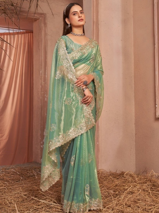 Chic Shimmer Net Saree Adorned with Swarovski Stones and Embroidered Patterns